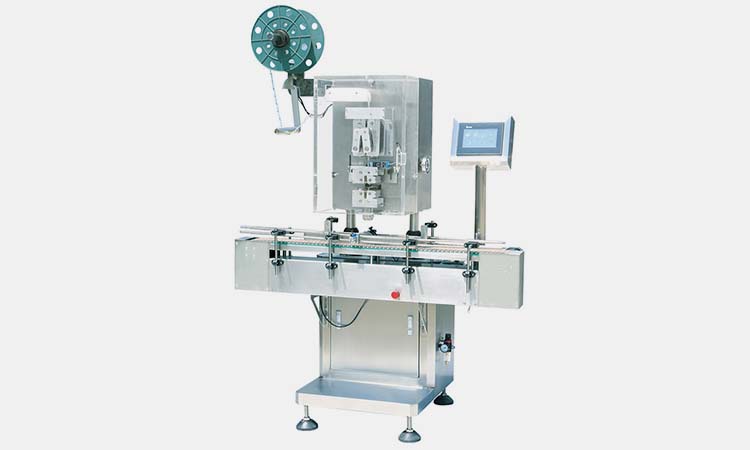 Desiccant insert machine