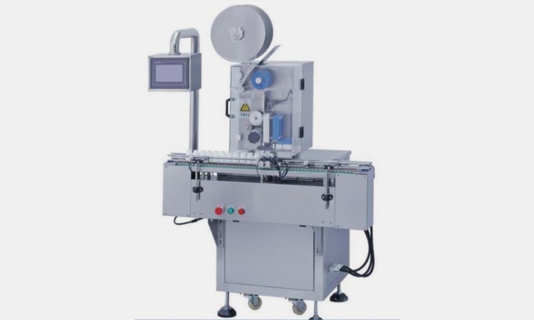 Desiccant insert machine