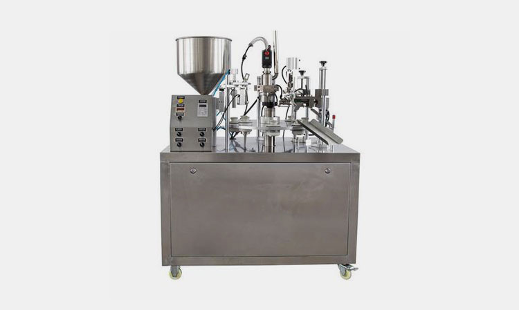 Semi-automatic tube filling machine